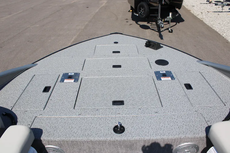 Slide: The Image of 2023 Lowe SD224 Sport Deck boat deck with storage compartments. - 5