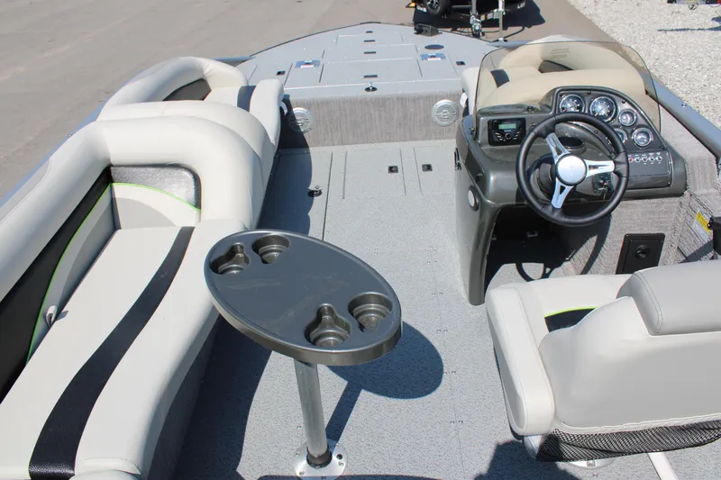 Slide: The Image of 2023 Lowe SD224 Sport Deck boat interior with seating and steering console. - 9