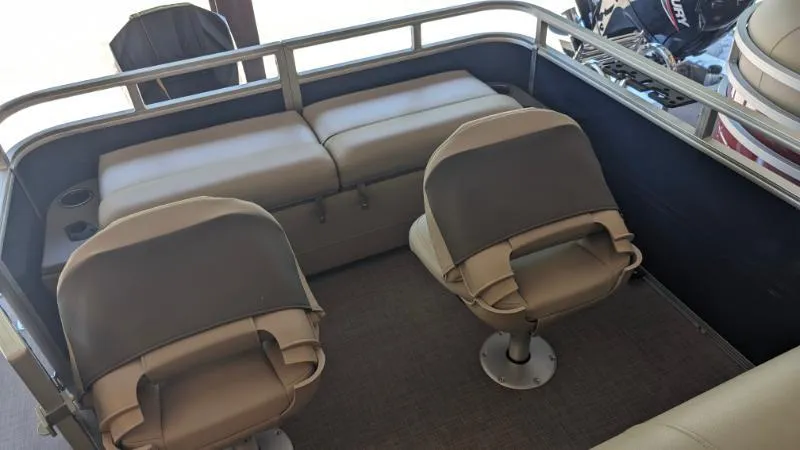 Slide: The Image of 2024 Sun Tracker Fishin' Barge 22 XP3 interior with seating and fishing chairs. - 47