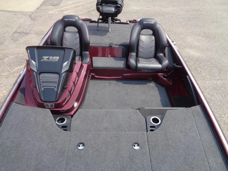 Slide: The Image of 2024 Nitro Z18 boat interior with dual seats and storage compartments. - 10