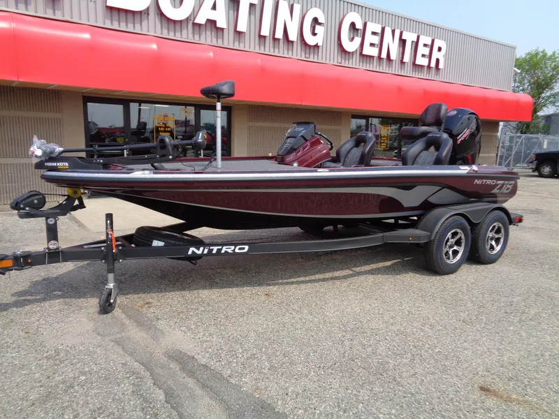 Slide: The Image of 2024 Nitro Z18 boat on trailer outside Boating Center. - 2