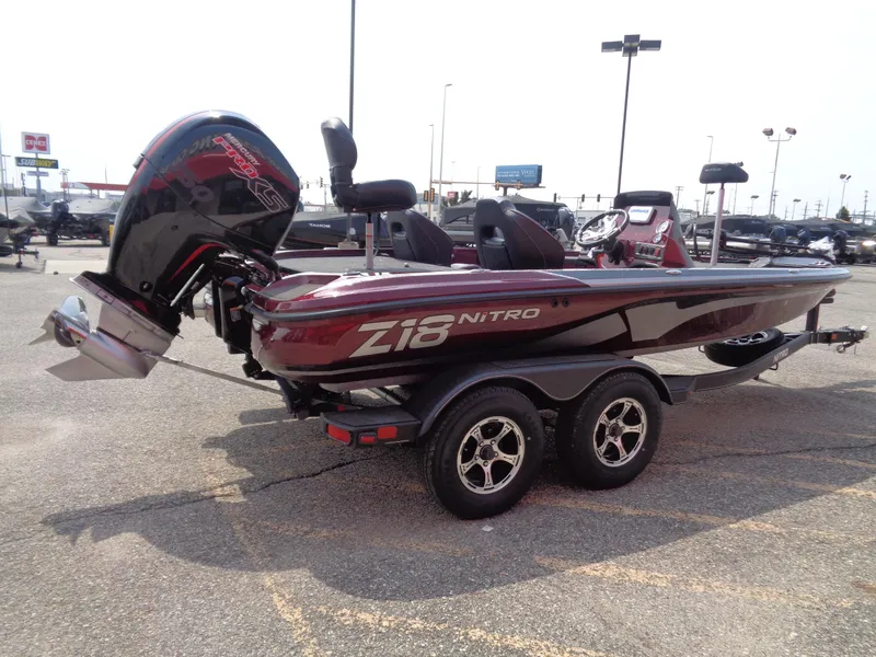 Slide: The Image of 2024 Nitro Z18 boat on trailer in parking lot. - 5