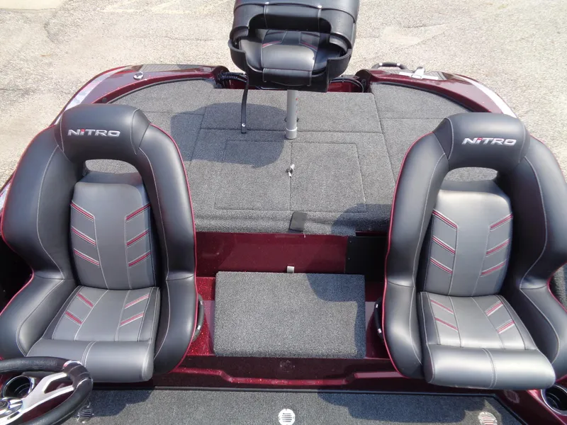 Slide: The Image of 2024 Nitro Z18 boat interior with black and red seats. - 9