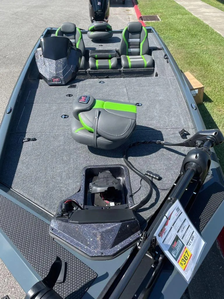 Slide: The Image of 2024 Ranger RT188P fishing boat with green and black seats and advanced equipment. - 3