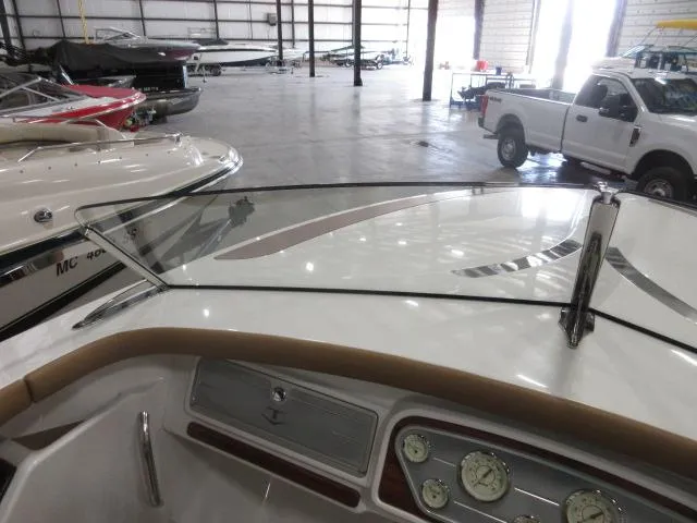 Slide: The Image of Interior view of 2023 Thoroughbred u23i boat in a storage facility. - 31