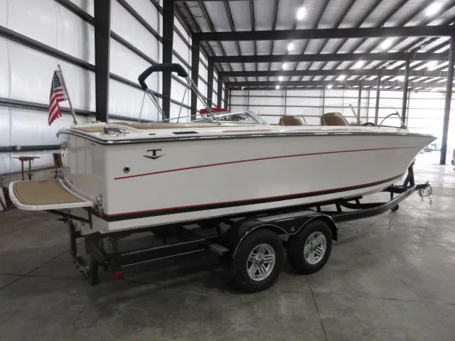 Slide: The Image of 2023 Thoroughbred u23i boat on trailer in warehouse. - 5