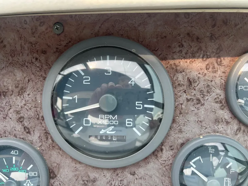 Slide: The Image of Close-up of 1996 Sea Ray 330 Sundancer RPM gauge showing 1843 hours. - 30
