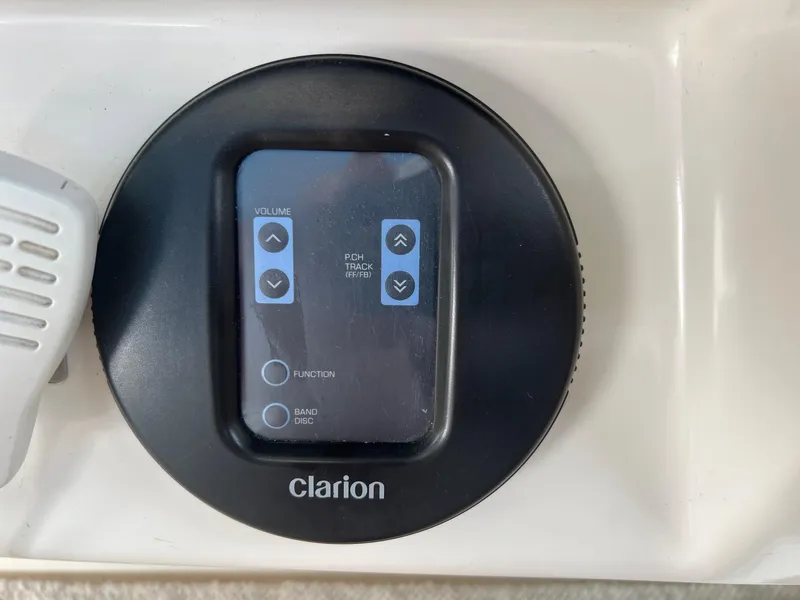 Slide: The Image of Clarion audio control panel on 1996 Sea Ray 330 Sundancer boat. - 36