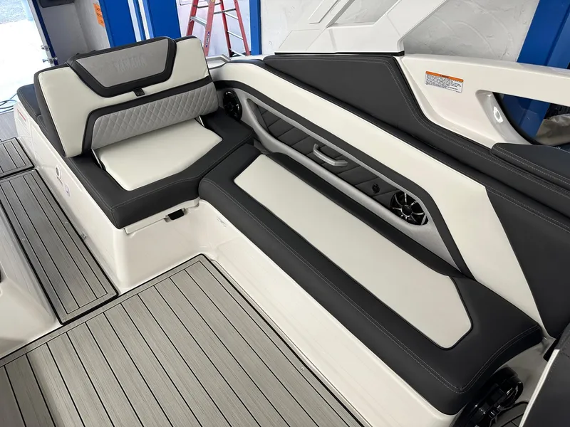 Slide: The Image of Interior of 2023 Yamaha Boats 275SD featuring stylish seating. - 5