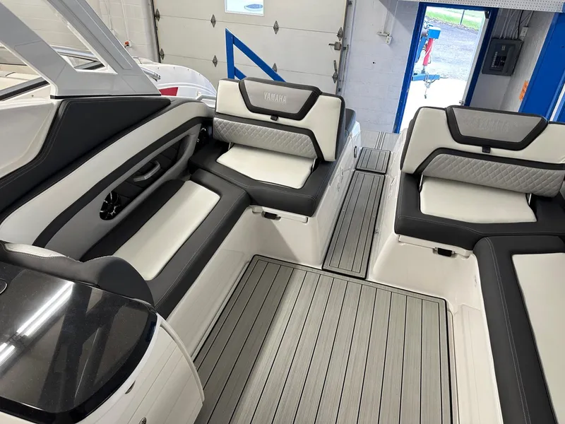 Slide: The Image of Interior of 2023 Yamaha Boats 275SD with luxurious seating. - 6