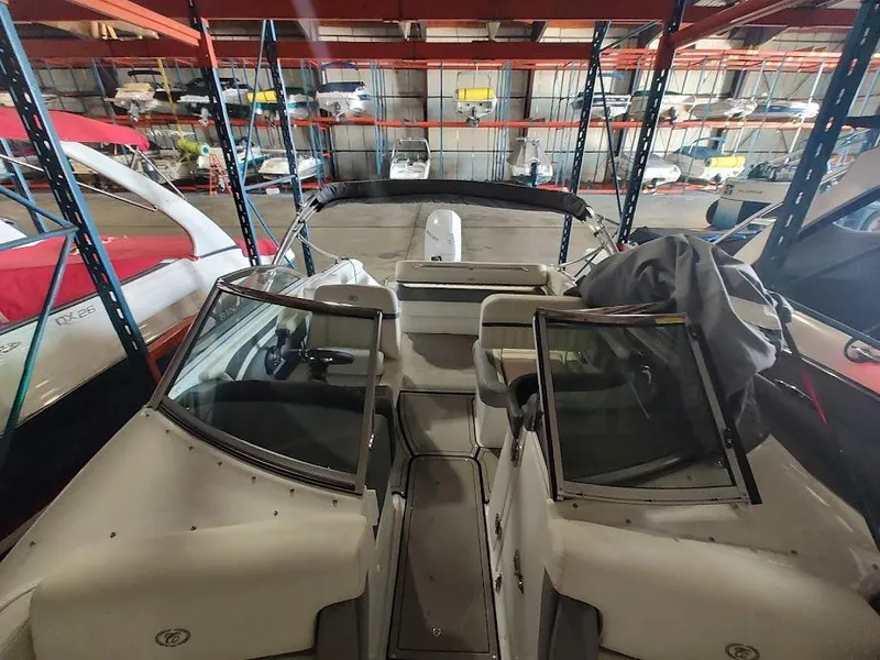 Slide: The Image of 2022 Cobalt 23SC boat in indoor storage facility. - 22