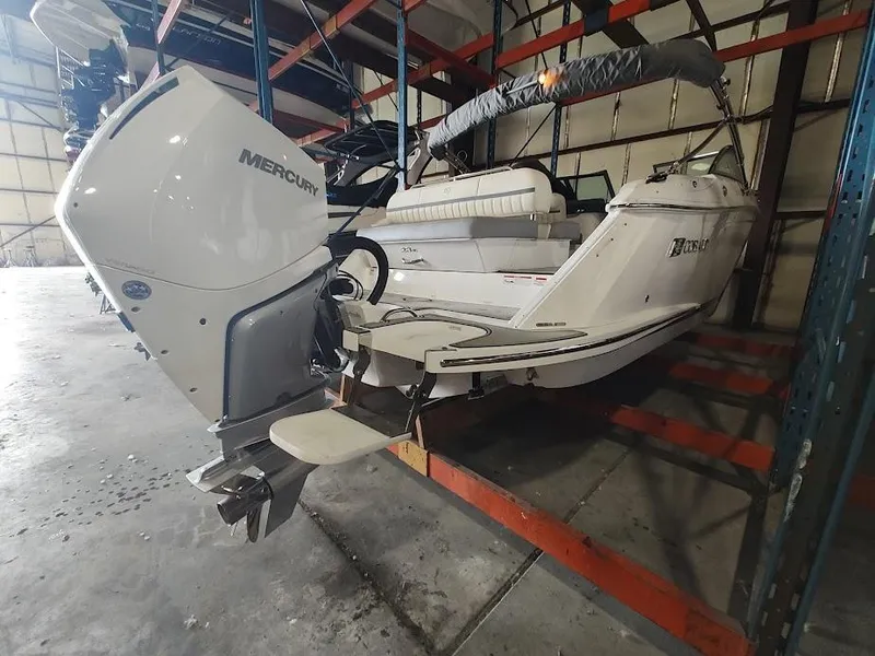 Slide: The Image of 2022 Cobalt 23SC boat with Mercury outboard engine in storage. - 41