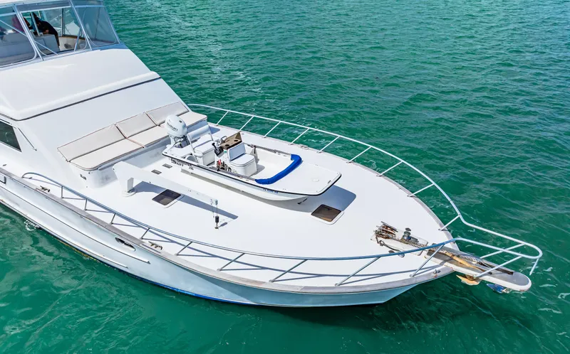 Slide: The Image of White 1996 Blackwell 72 yacht on clear blue water. - 3