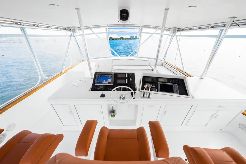 Slide: The Image of Helm of 1996 Blackwell 72 yacht with modern navigation equipment and ocean view. - 39