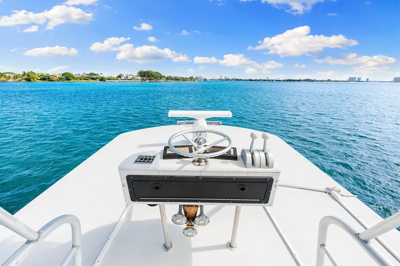 Slide: The Image of View from the helm of a 1996 Blackwell 72 boat on a sunny day. - 48