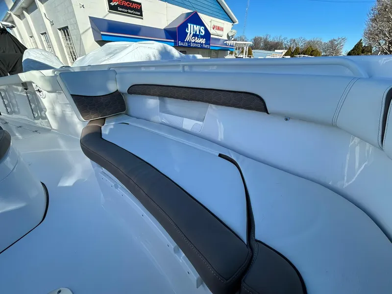 Slide: The Image of 2025 Tidewater 256 LXF boat interior with sleek seating design at Jim's Marina. - 13