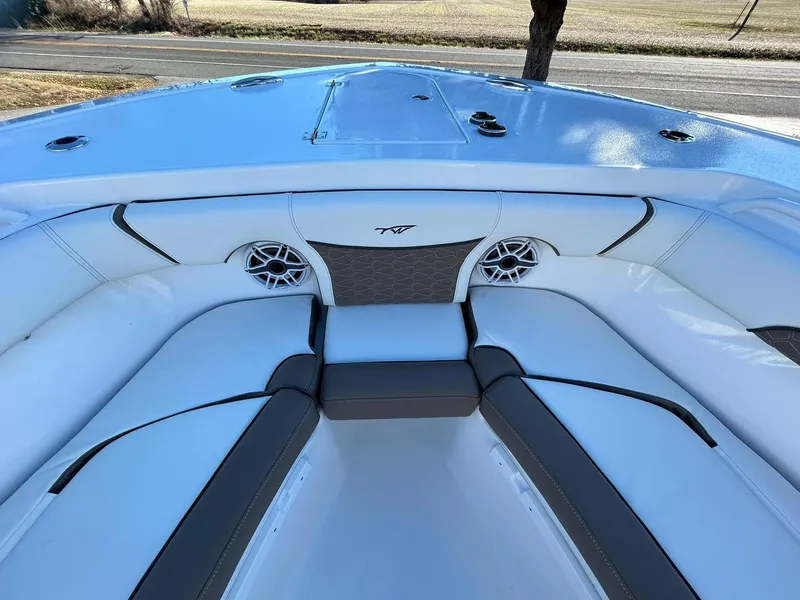 Slide: The Image of 2025 Tidewater 256 LXF boat interior with sleek seating and modern design. - 16