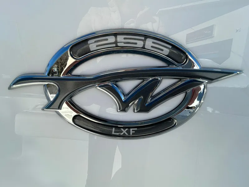 Slide: The Image of Tidewater 256 LXF 2025 emblem on a sleek white surface. - 4
