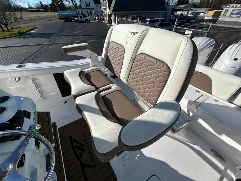 Slide: The Image of 2025 Tidewater 256 LXF boat with luxurious seating and modern design. - 46
