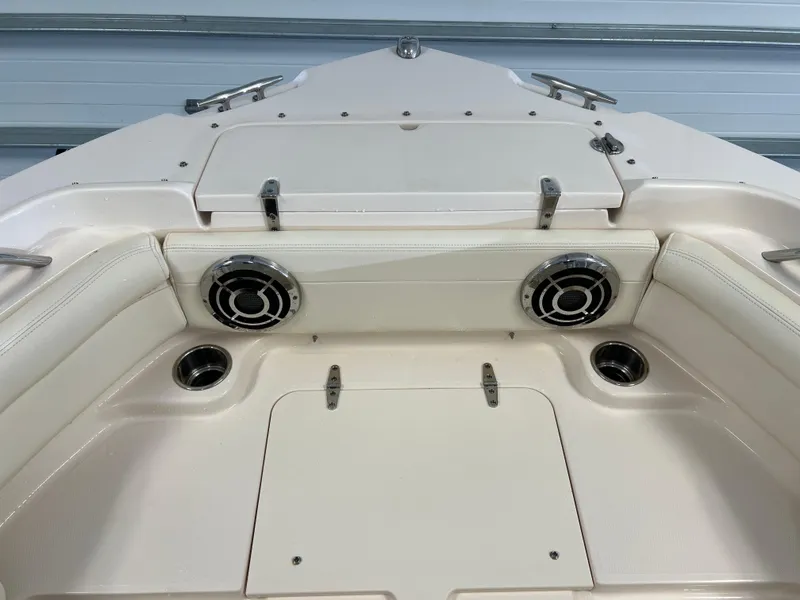 Slide: The Image of 2016 Grady-White Freedom 225 boat interior with seating and storage compartments. - 13