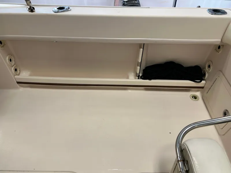 Slide: The Image of 2016 Grady-White Freedom 225 boat interior storage compartment. - 24
