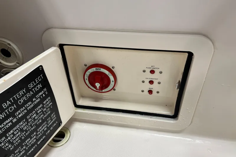 Slide: The Image of Battery selector switch panel on a 2016 Grady-White Freedom 225 boat. - 35