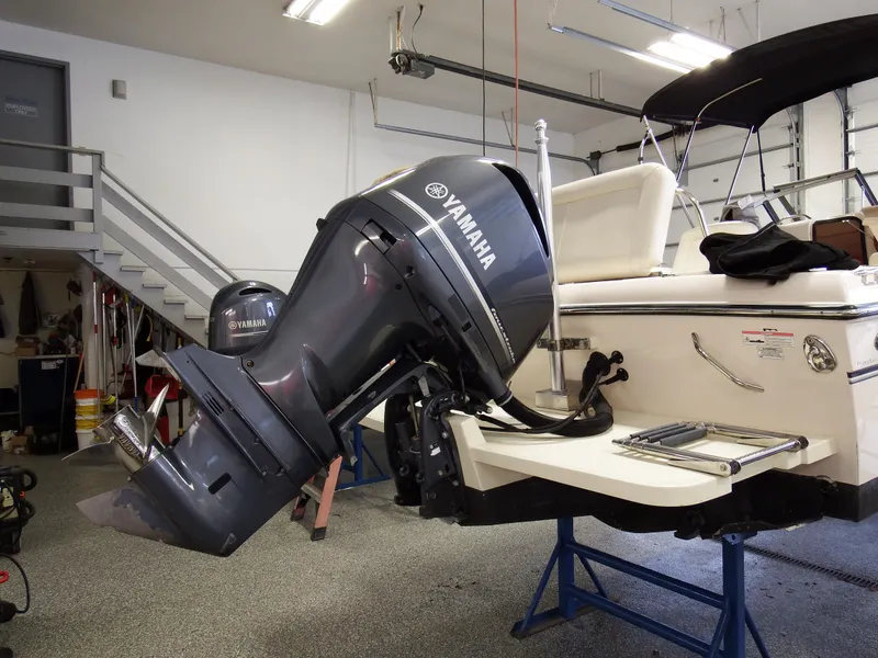 Slide: The Image of 2016 Grady-White Freedom 225 boat with Yamaha outboard motor in garage. - 46
