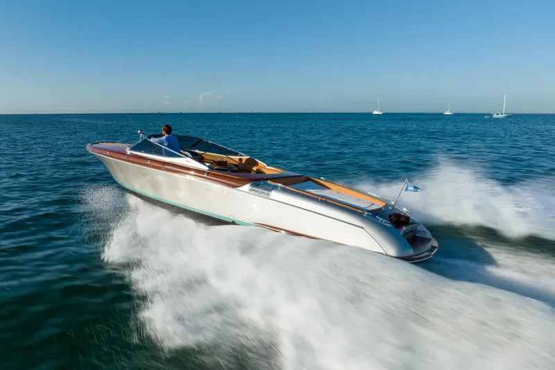 Slide: The Image of 2020 Riva Aquariva speedboat cruising on open water. - 14