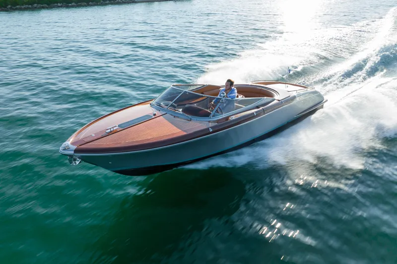 Slide: The Image of 2020 Riva Aquariva speedboat cruising on open water. - 8