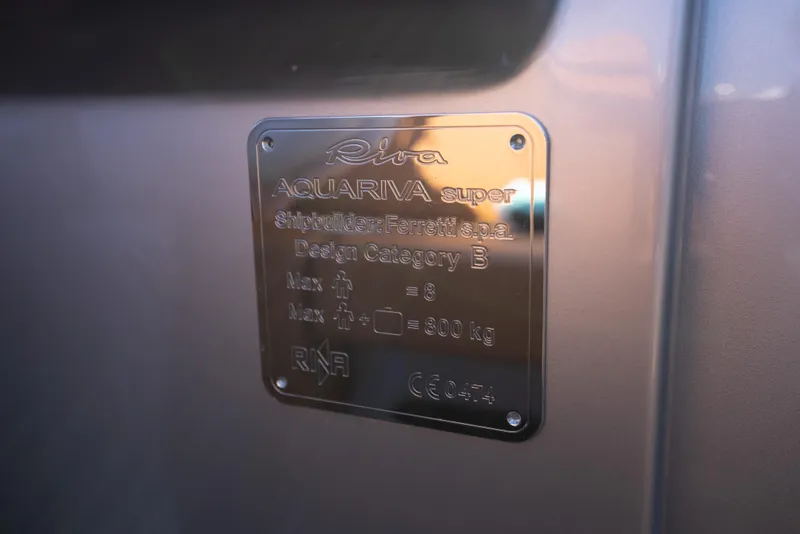 Slide: The Image of Metallic nameplate on a 2020 Riva Aquariva boat displaying specifications. - 27