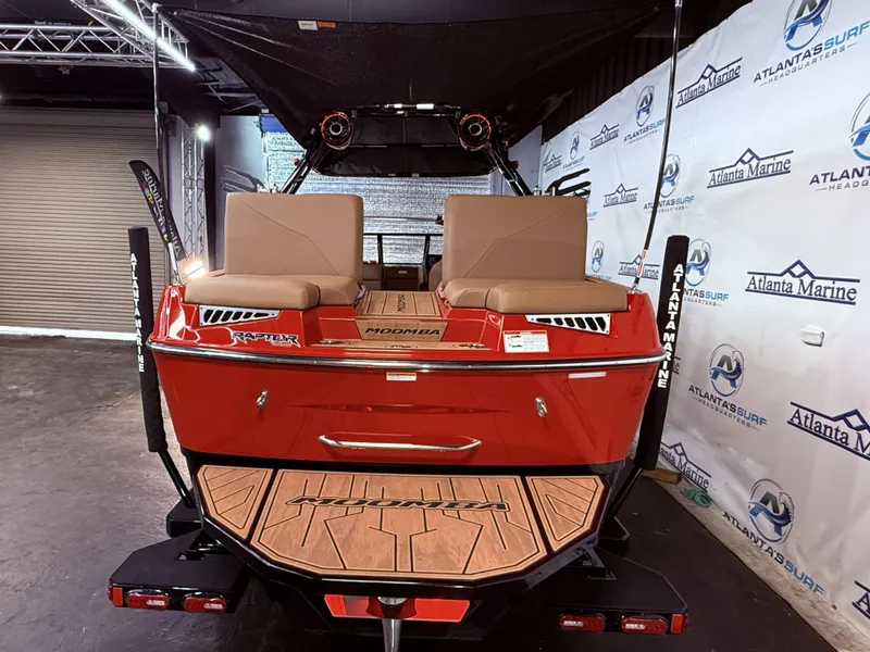 Slide: The Image of Red 2023 Moomba Mojo boat in showroom with Atlanta Marine branding. - 13