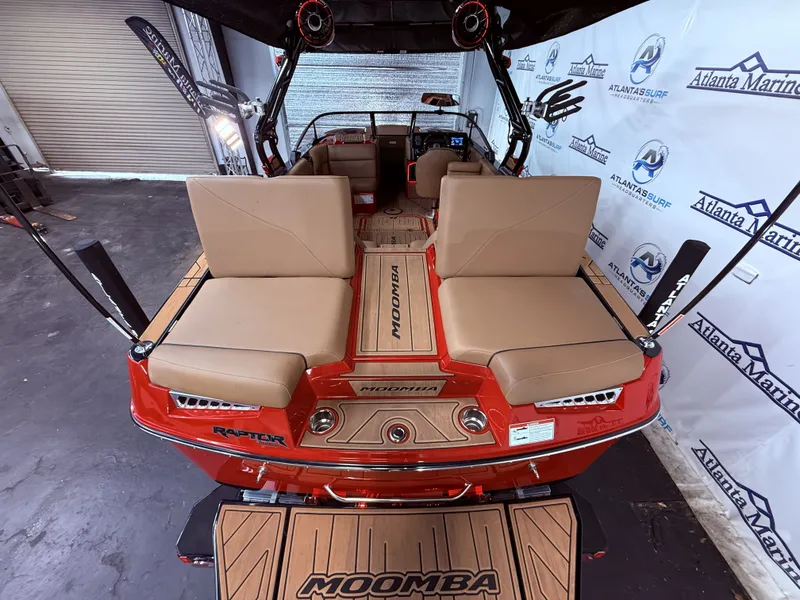 Slide: The Image of 2023 Moomba Mojo boat with luxurious interior and Atlanta Marine branding. - 14