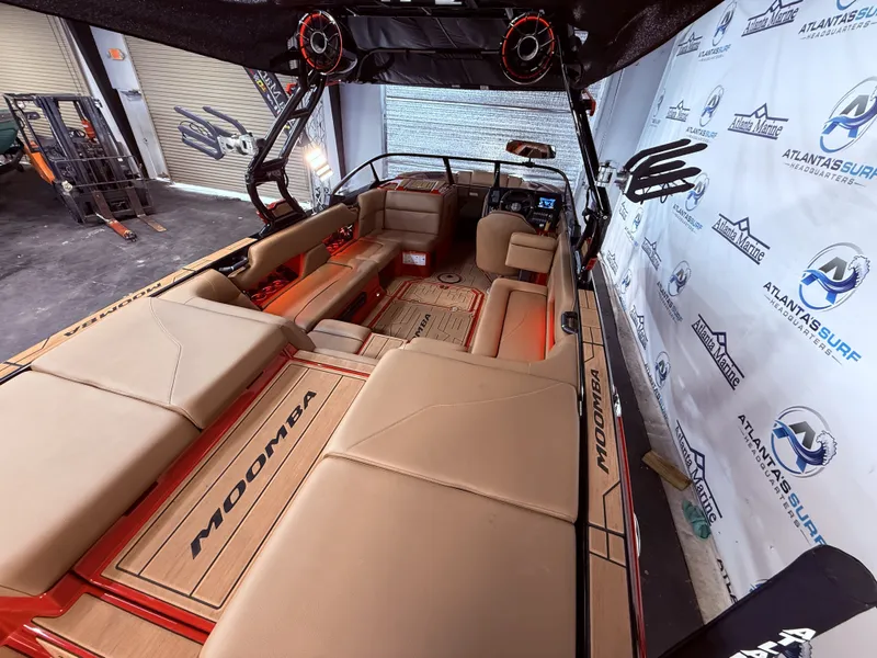 Slide: The Image of Interior of a 2023 Moomba Mojo boat with luxurious seating. - 16