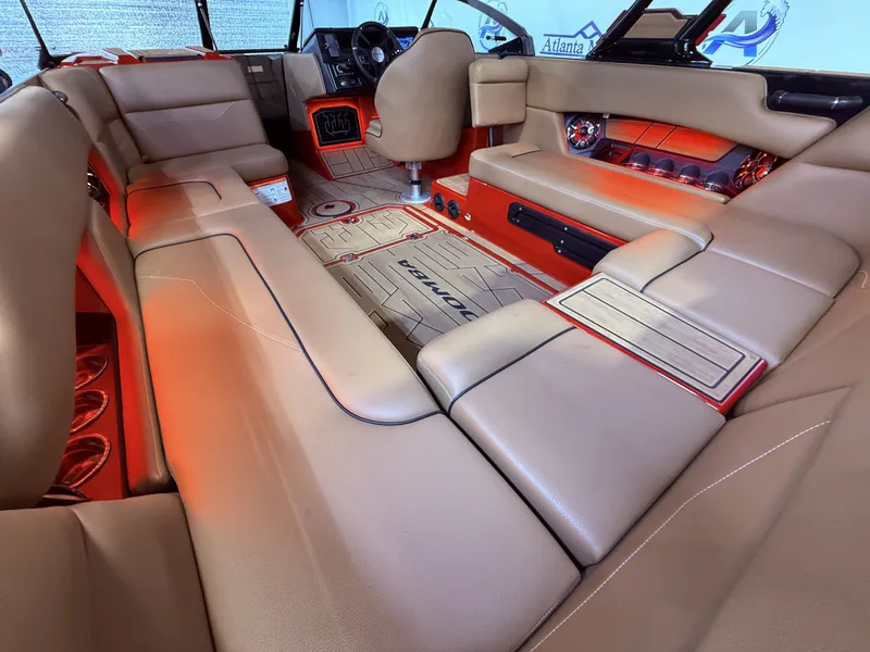 Slide: The Image of Interior of a 2023 Moomba Mojo boat with beige seating. - 20