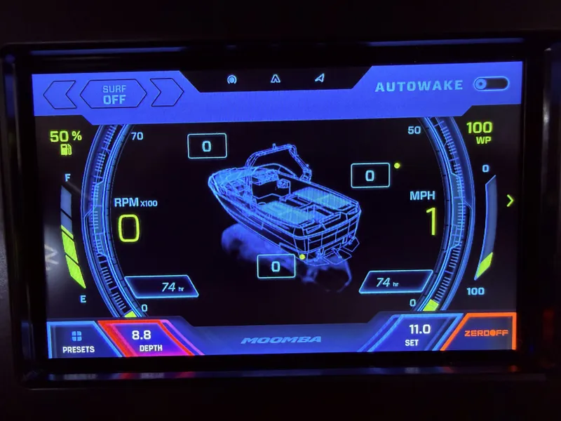 Slide: The Image of 2023 Moomba Mojo boat display with Autowake and surf options. - 25