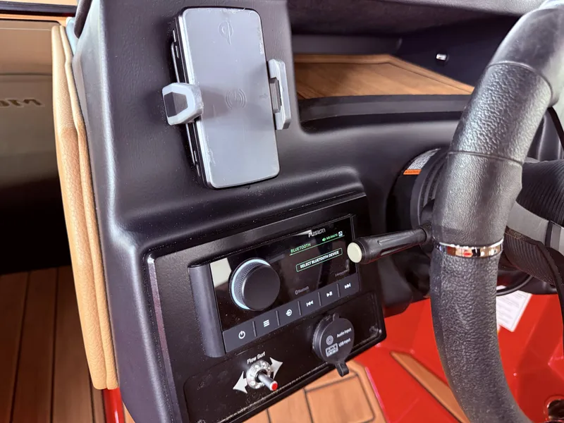 Slide: The Image of Dashboard of 2023 Moomba Mojo with Bluetooth controls. - 28