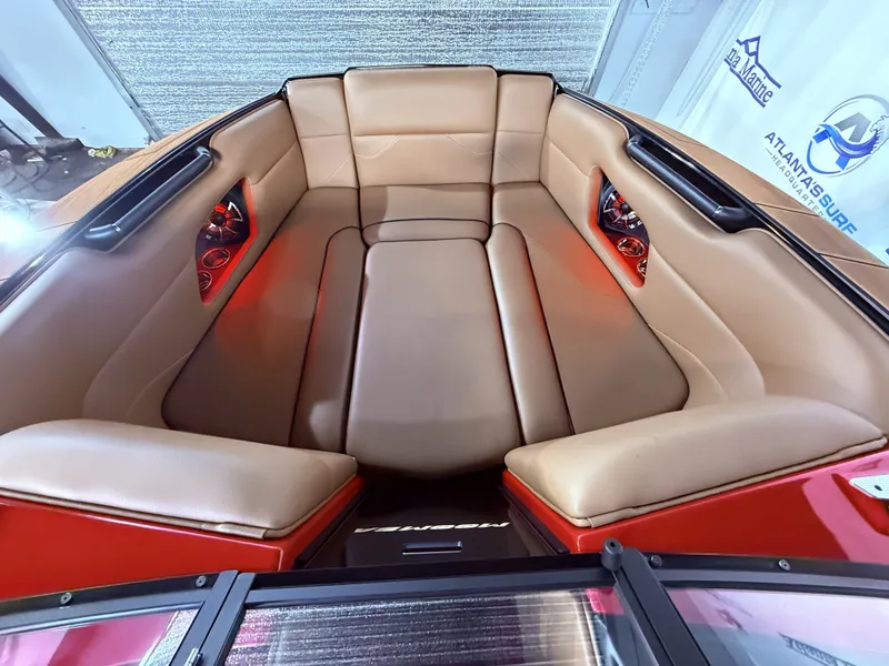 Slide: The Image of 2023 Moomba Mojo boat interior with beige leather seating. - 31