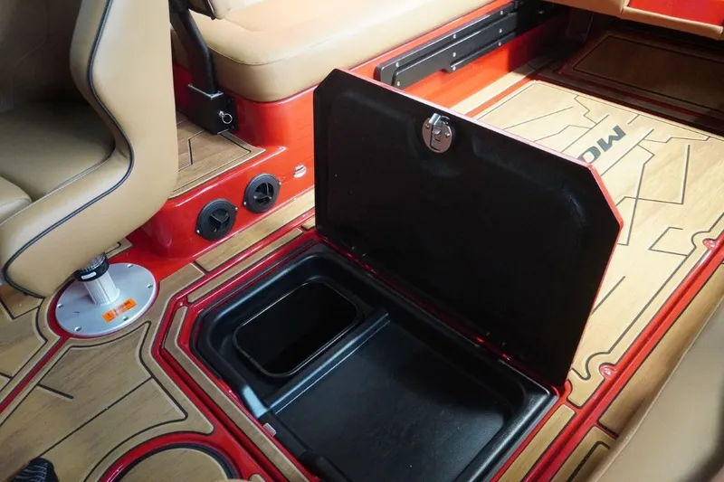 Slide: The Image of 2023 Moomba Mojo interior with storage compartment and seating area. - 45