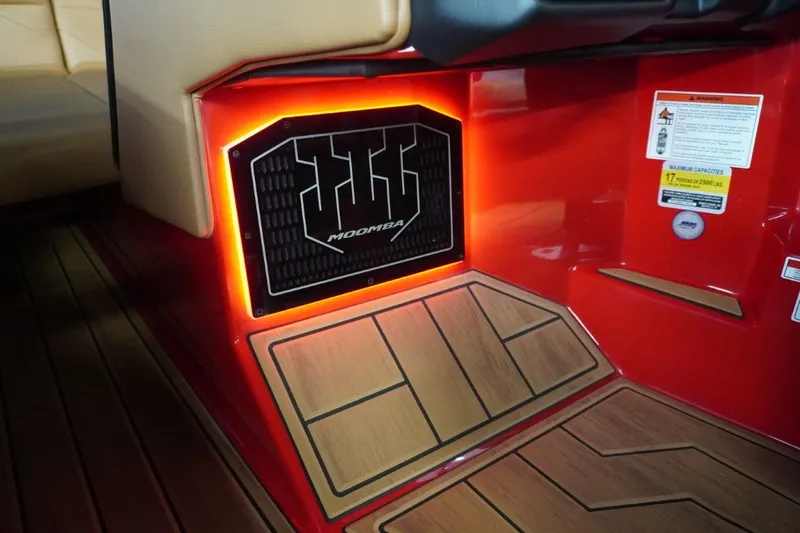 Slide: The Image of 2023 Moomba Mojo interior with illuminated logo and wood flooring. - 46