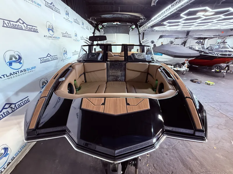 Slide: The Image of 2023 Supra SA 400 boat in Atlanta Marine showroom. - 11