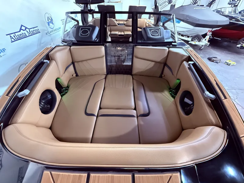 Slide: The Image of Interior of 2023 Supra SA 400 boat with luxurious seating. - 12