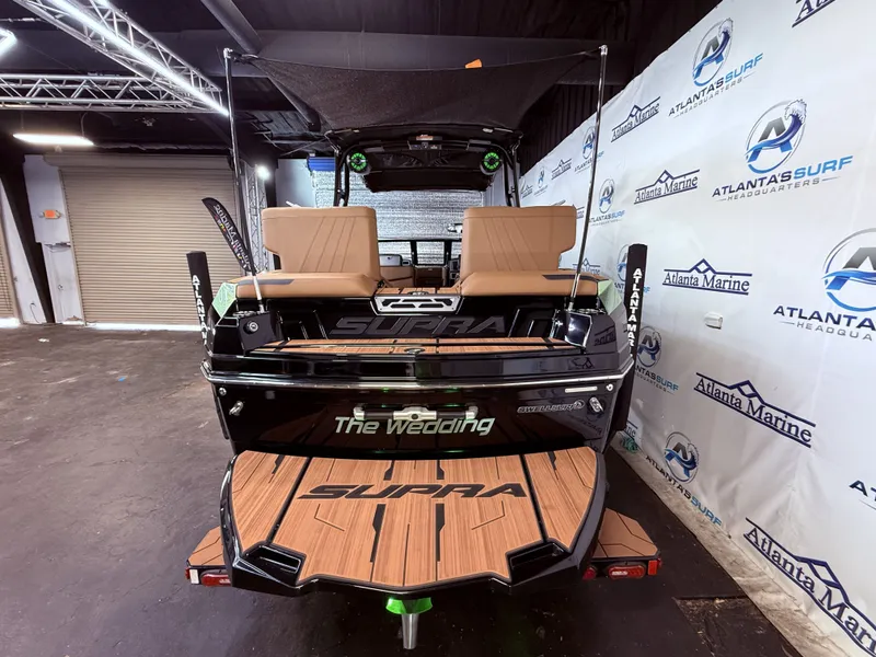 Slide: The Image of 2023 Supra SA 400 boat in Atlanta Marine showroom. - 15