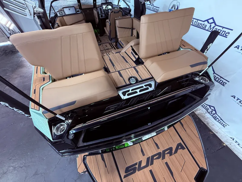 Slide: The Image of Interior of 2023 Supra SA 400 boat with luxurious seating. - 17