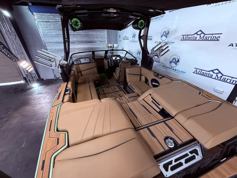 Slide: The Image of Interior of 2023 Supra SA 400 boat with luxurious seating. - 18