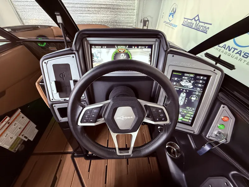 Slide: The Image of Interior of 2023 Supra SA 400 with modern dashboard and steering wheel. - 28