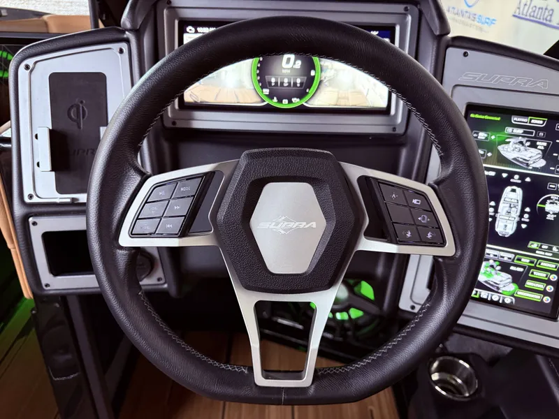 Slide: The Image of 2023 Supra SA 400 steering wheel with modern controls. - 29