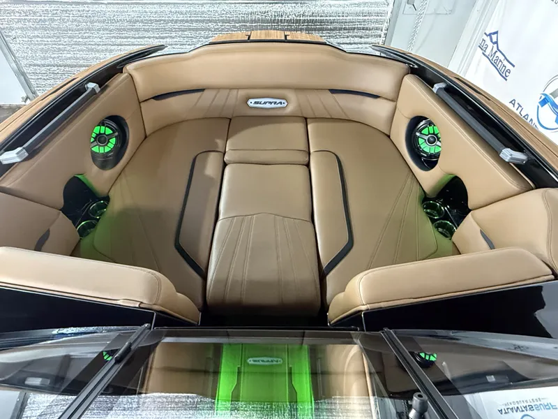 Slide: The Image of Interior of 2023 Supra SA 400 with brown leather seating. - 34