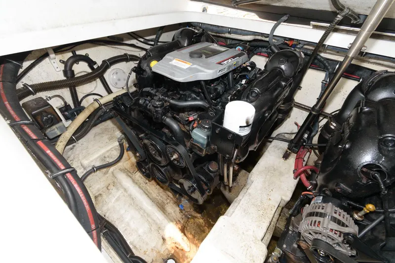 Slide: The Image of 2012 Formula 310 Bowrider engine compartment with visible engine components. - 17