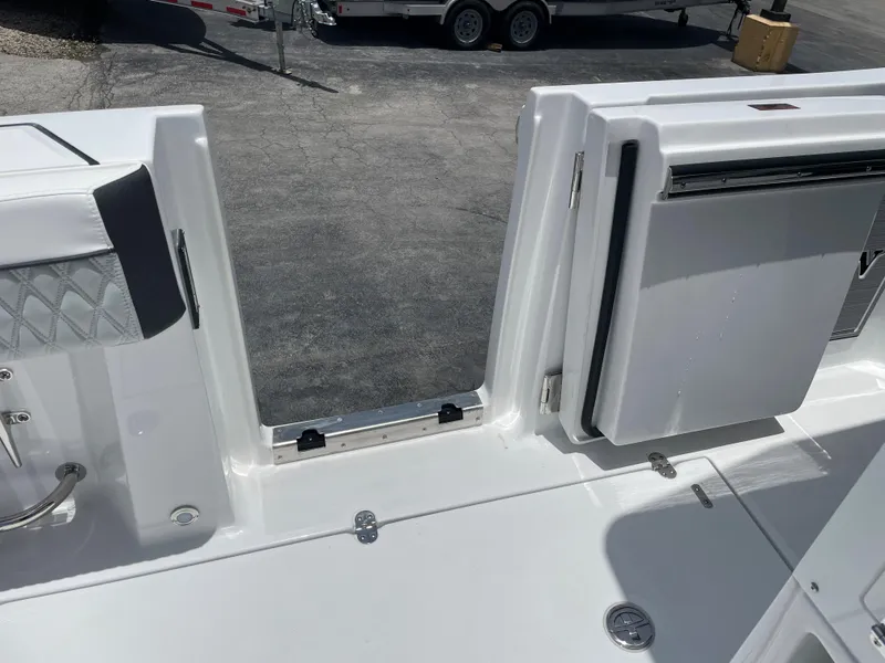 Slide: The Image of 2024 Blackfin 332cc boat deck with open side door. - 10