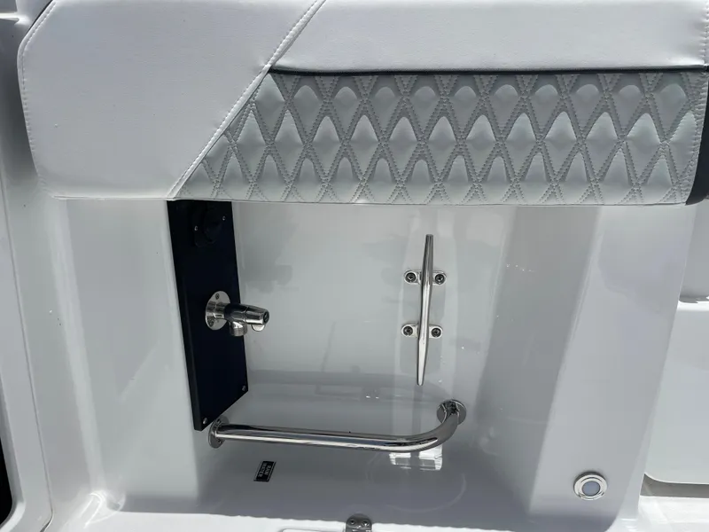 Slide: The Image of 2024 Blackfin 332cc boat interior detail with diamond-stitched upholstery and stainless steel hardware. - 11